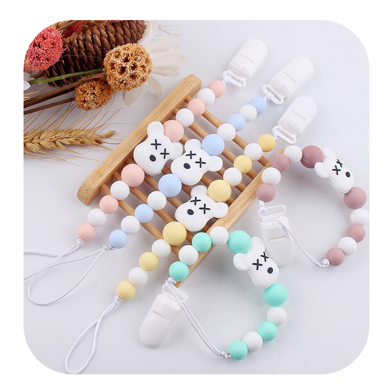 Nuevos artículos para bebés de dibujos animados violentos oso silicona calmar cadena de tetas para bebés palillos cadena de tetas anti-caída cadena