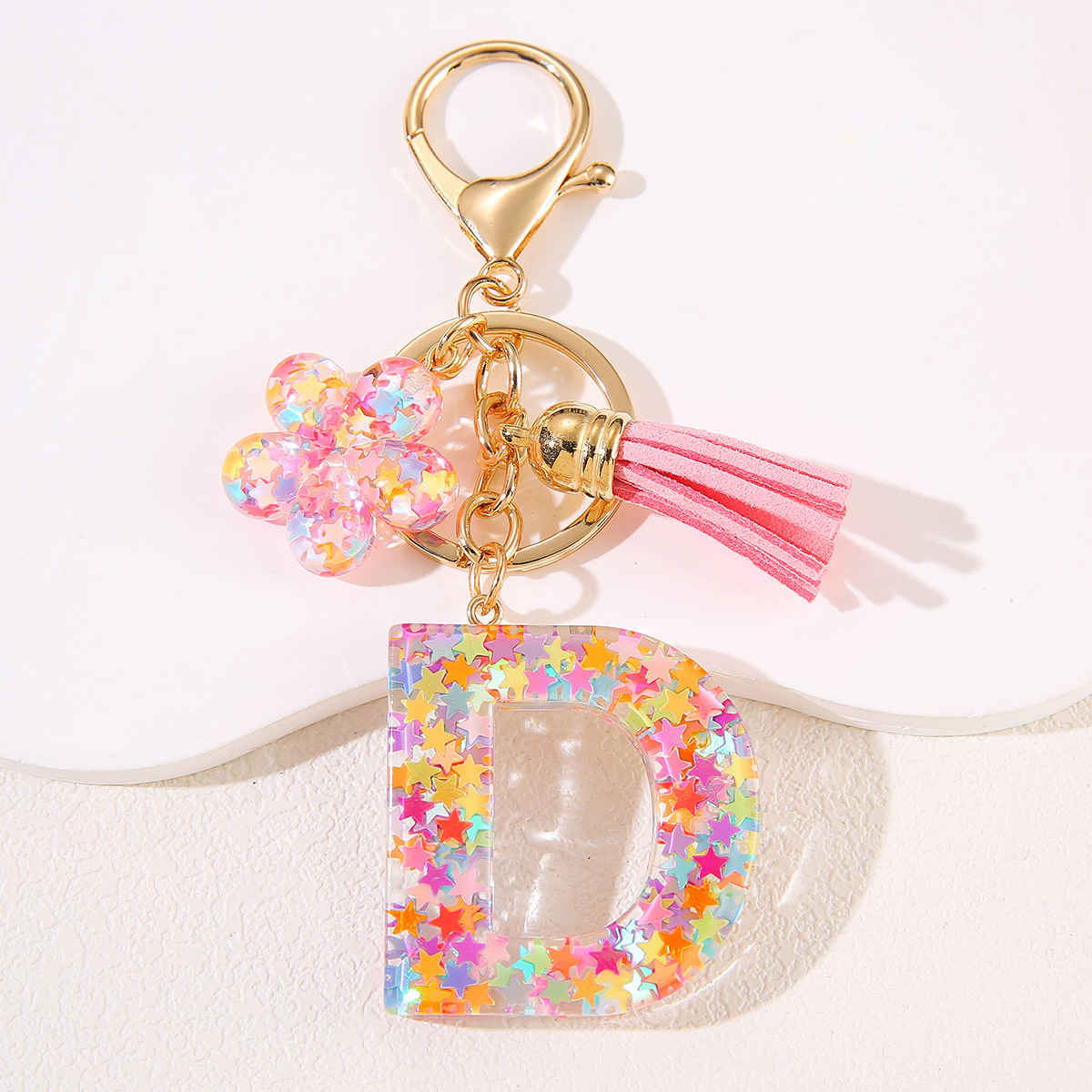 Un nuevo llavero flor de goteo de goma esquinilla 26 letras bolsos colgante llavero accesorios Yiwu