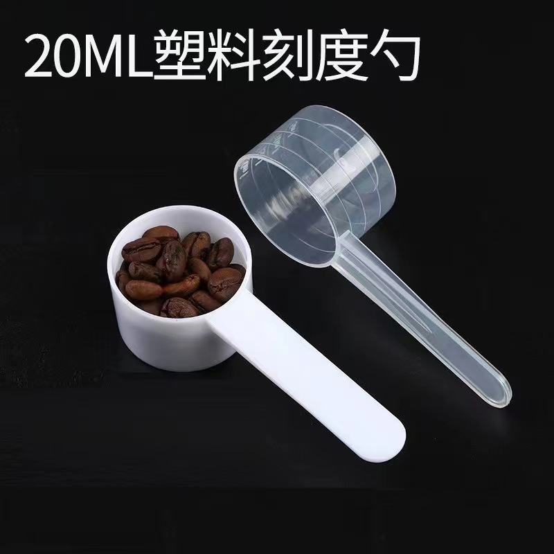 Plastic measuring spoon for home use