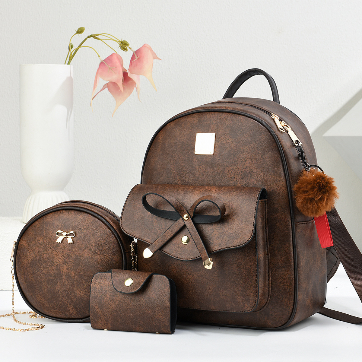 Nuevo estilo de moda de 2025 estilo coreano PU mochila pequeña multipropósito ligera de tres piezas mochila para mujeres