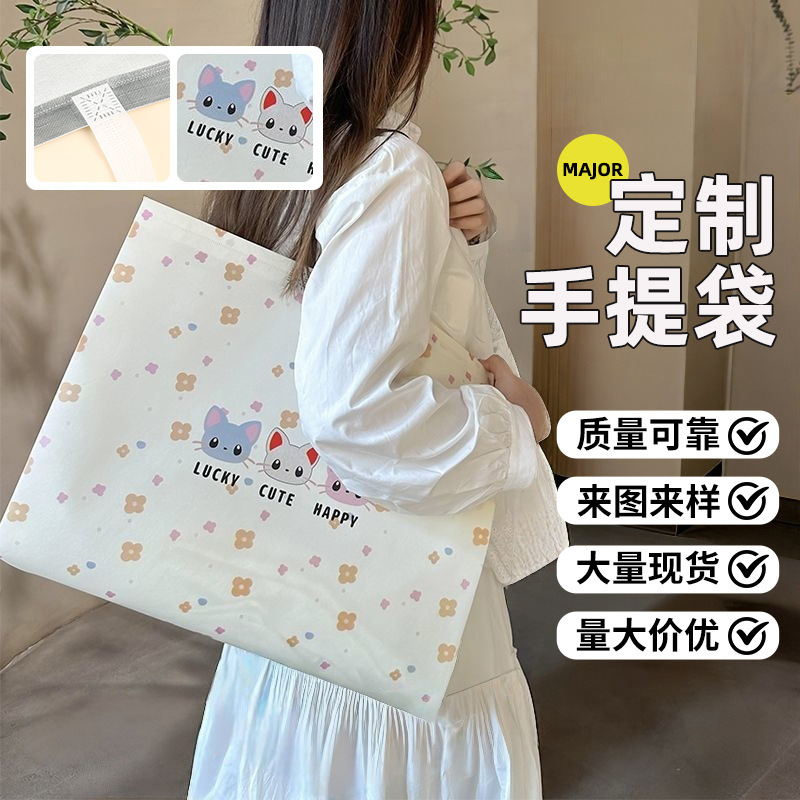 衣料品店用の既製の不織布バッグ、ロゴが印刷された高級環境に優しい広告ショッピングハンドバッグ、カスタマイズ可能|undefined