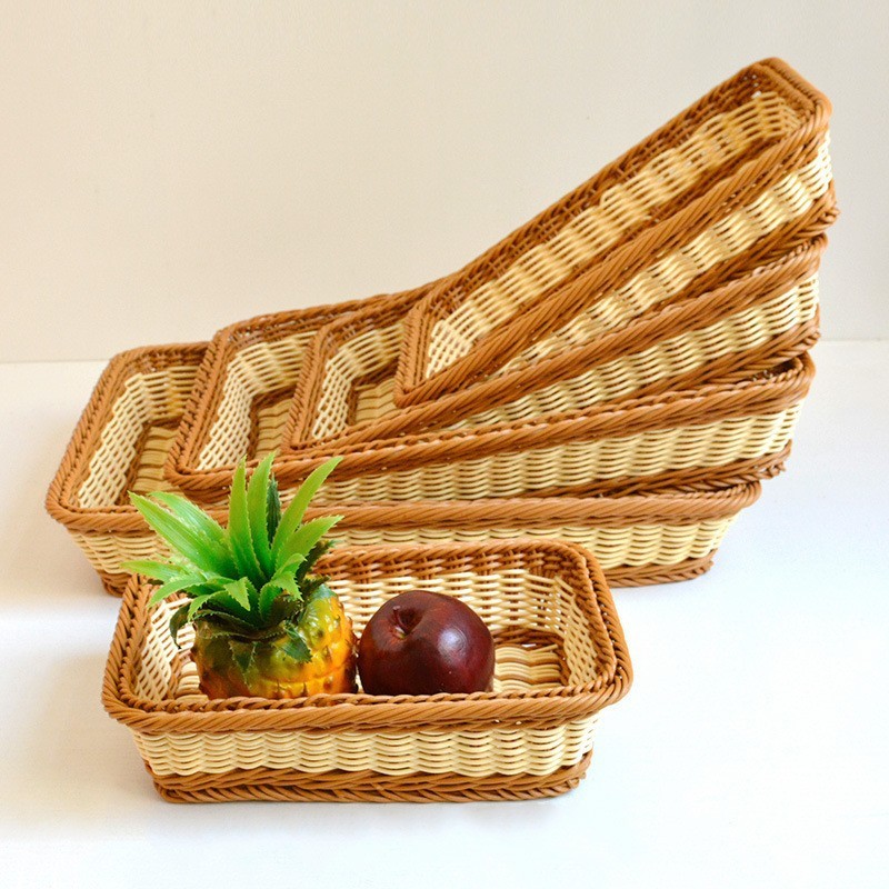 新商品の果物は藤のかごの台所の野菜を洗うかごの水たまりのかごの長方形のパンのかごを陳列して藤のパンの収納かごをまねます。|undefined