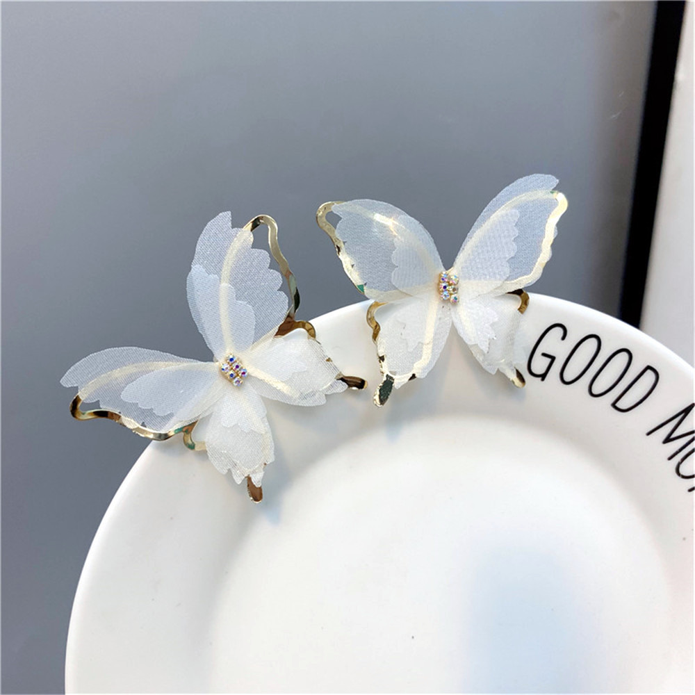 Fashion Hollow Butterfly Diamond-studded Earrings display picture 9