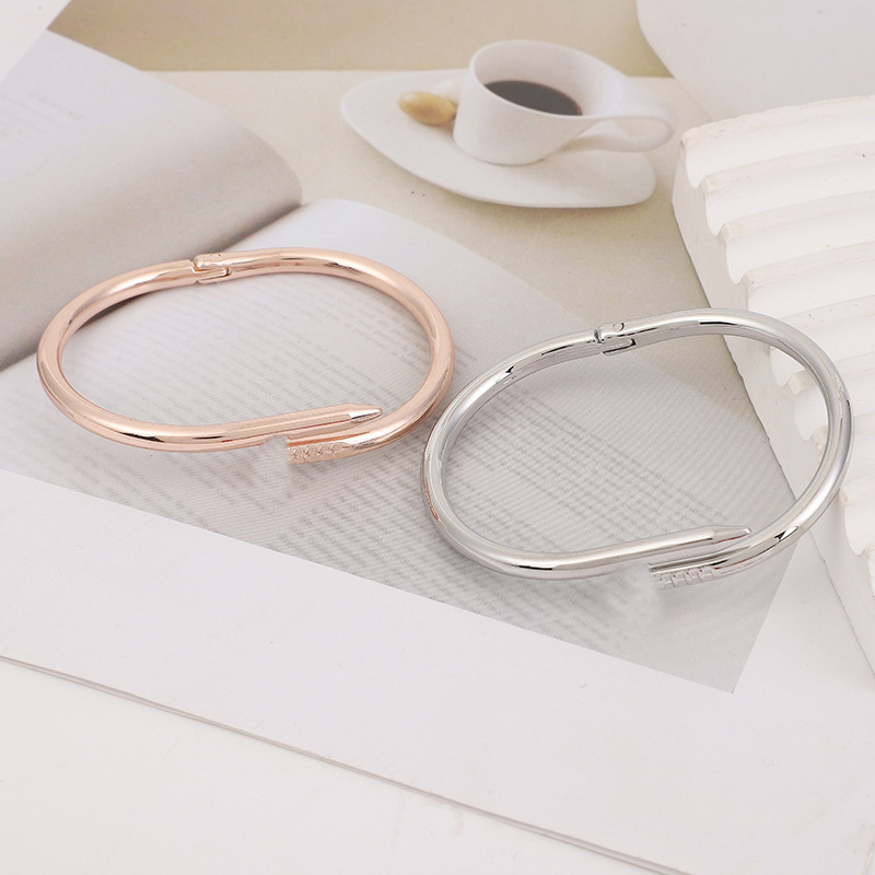 Cross-border European and American fashion couple nail alloy bracelet women's simple light luxury Joker opening bracelet jewelry manufacturers wholesale