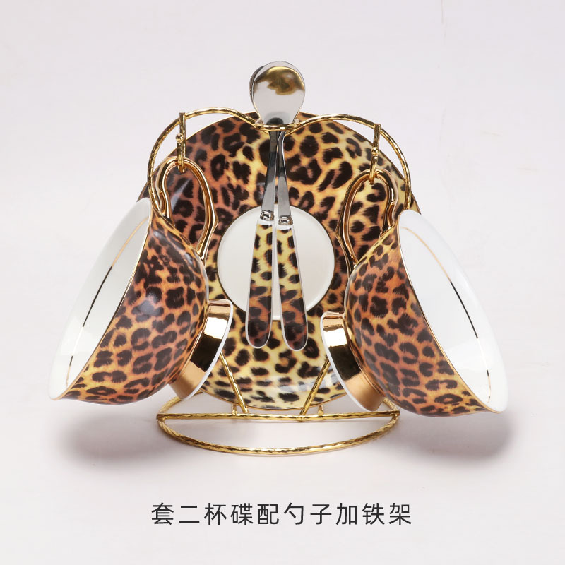 Leopardo de lujo ligero hueso de porcelana taza de café y plato conjunto de taza de té europea en línea exquisita taza de cerámica plato clásico alto valor nominal
