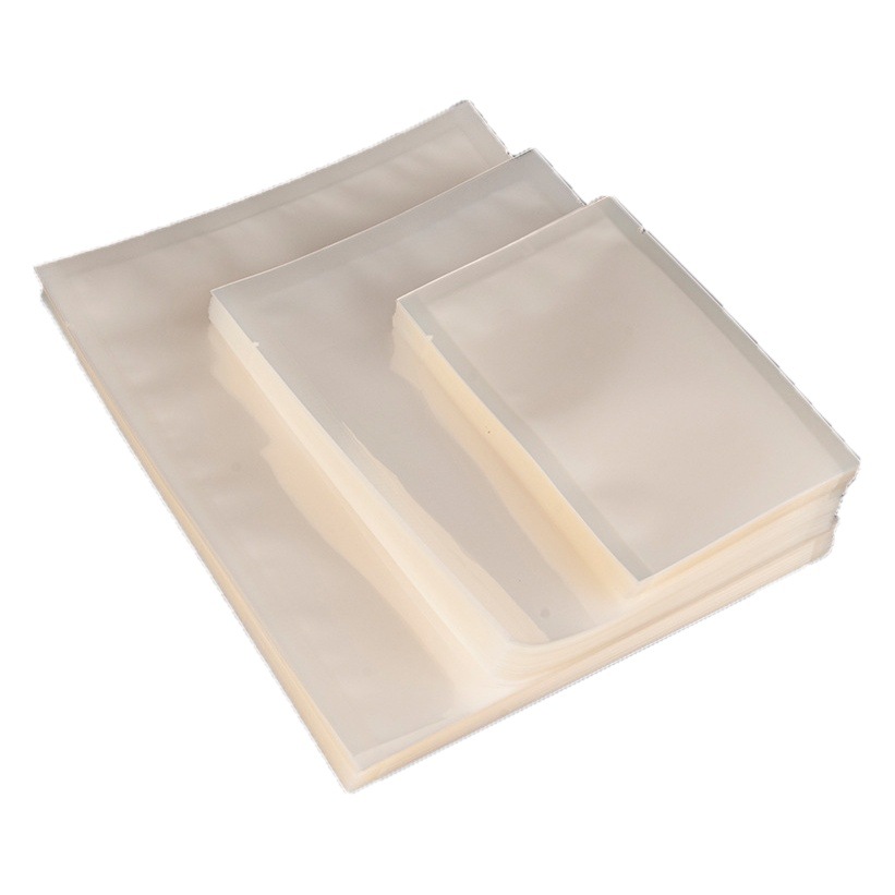 Bolsa sellada brillante Bolsa de embalaje de plástico para alimentos Bolsa de embalaje al vacío gruesa al por mayor Bolsa de plástico al vacío transparente fácil de rasgar