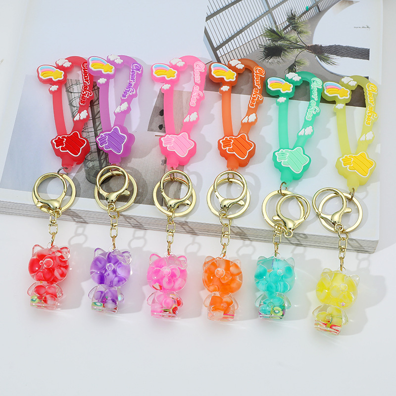 Caricatura KT en botella de arena flotante de aceite en burbujas de aceite llavero llavero de automóvil regalos de vacaciones