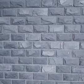 厂家直销天然青石板蘑菇石黑绣色凹凸外墙砖文化石背景墙石材