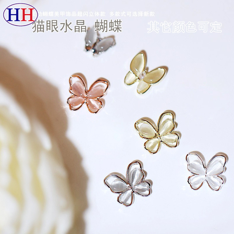 Nuevo hueco 3D Opal mariposa uñas joyería aleación rhinestone mariposa uñas etiqueta fábrica al por mayor