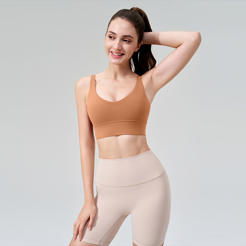 La nueva ropa interior deportiva a prueba de golpes transfronteriza para mujeres se reúne profundamente V fitness hermosa espalda desnuda con almohadilla para el pecho sujetador de yoga sin costuras