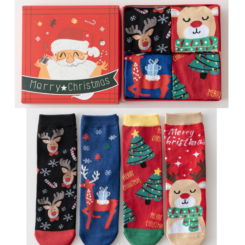 Medias de Navidad transfronterizas caja de regalo otoño y invierno nuevos productos de dibujos animados estereoscópicos lindos calcetines de mediana de mujer mediana medias rojas de Navidad al por mayor