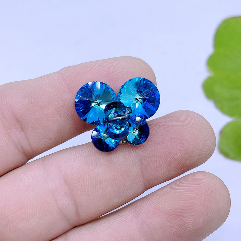 Fashionable blue sophisticated brooch with rhinestones