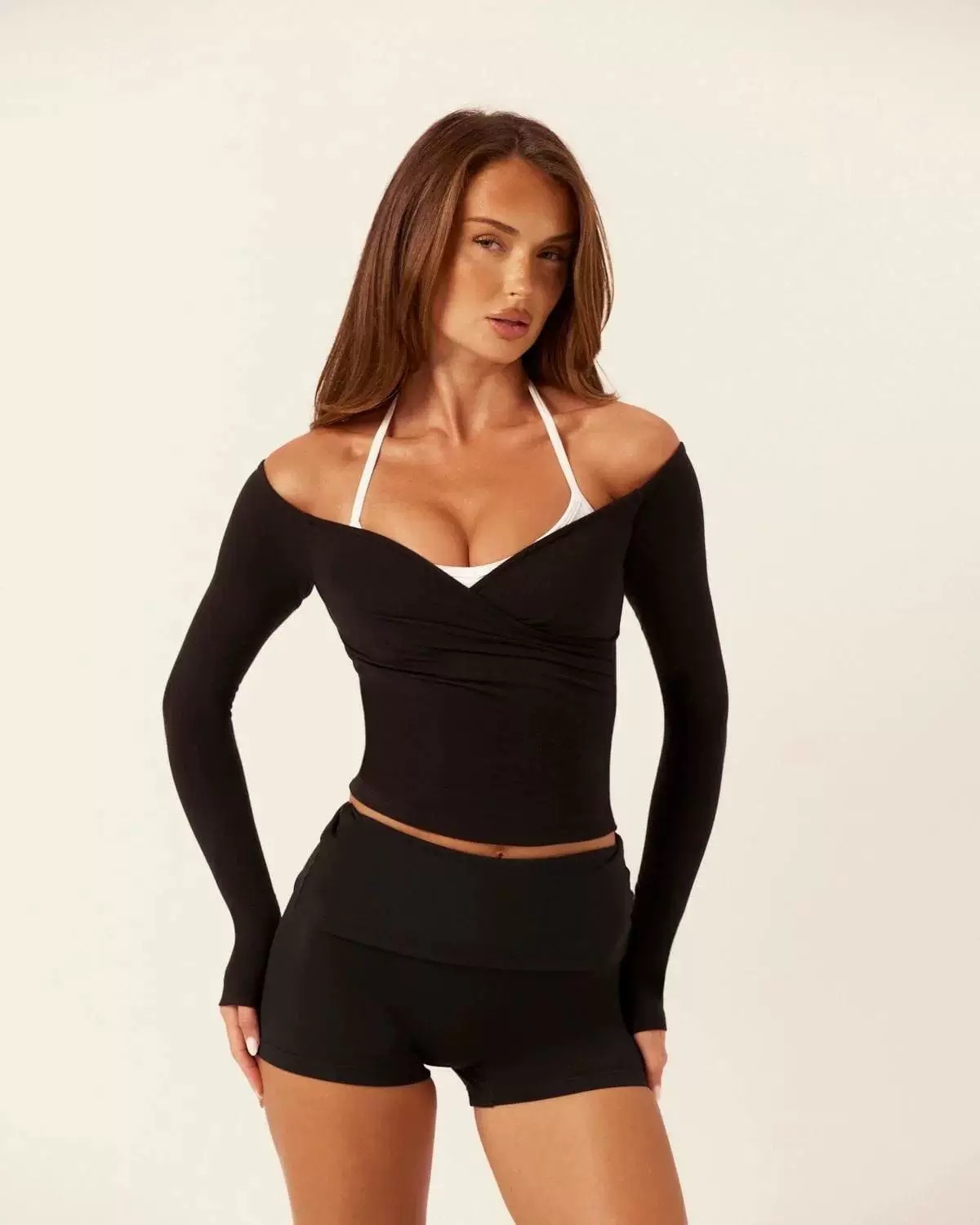 Comercio exterior de Europa y Estados Unidos Yoga transfronterizo de manga larga mujer con cojín de pecho de alta elasticidad y secado rápido envuelto en el pecho antichoque deportivo de acondicionamiento físico camisa de cuello V image 14