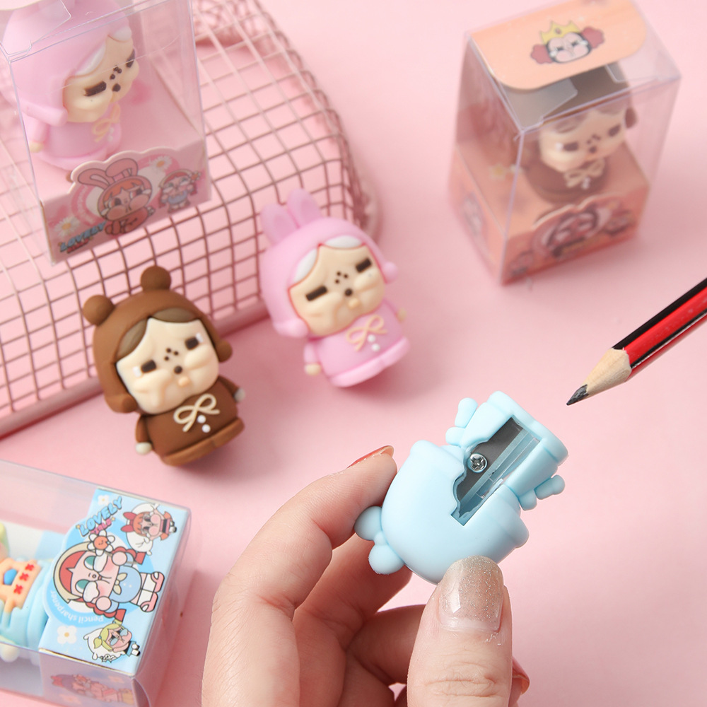 Cartoon llor muñeca cuchillo de lápiz de alto valor facial pegamento suave cuchillo de lápiz lindo grano estudiantes de primaria aprendizaje suministros de papelería