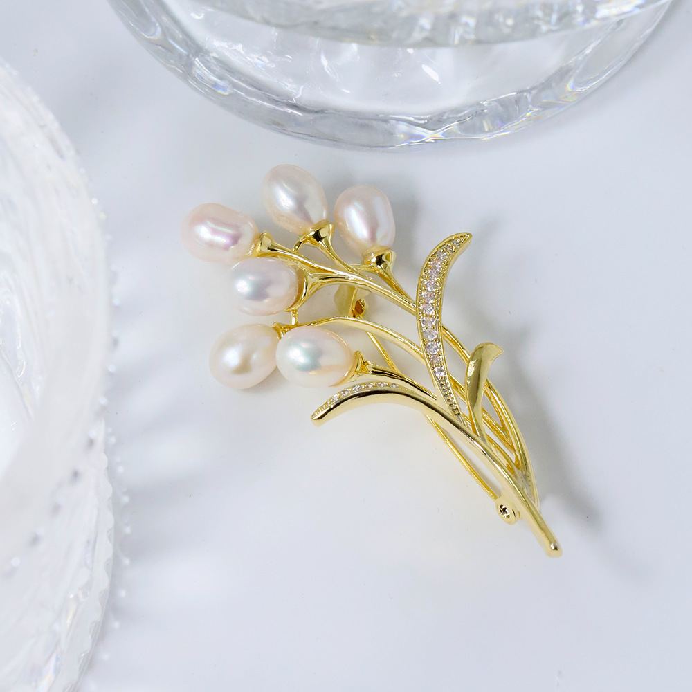 Nuevo globo original broche de perla de trigo de alta calidad nicho de diseño femenino broche coreano ligero de lujo pecho de moda