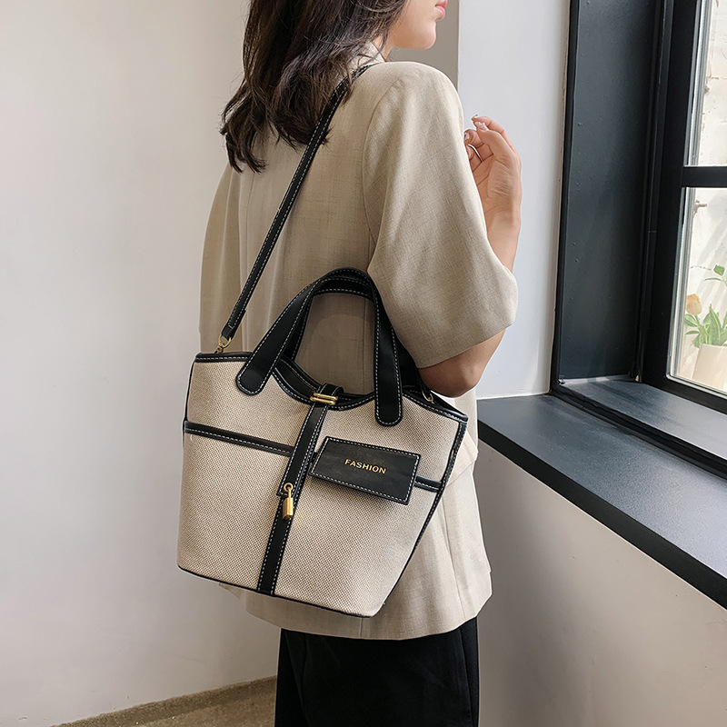 Nicho de diseño retrógrado lienzo portátil bolso de cubo de agua mujer 2026 nuevo cross-border ins canasta de moda bolso de mochila image 5