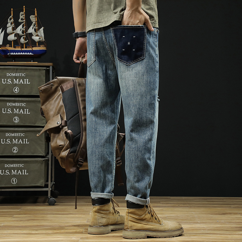 Herr vår/sommar ny produkt Big Bull Wind perforerade jeans lösa, lätta, andningsbara 9/4 fotbyxor_voghion.com