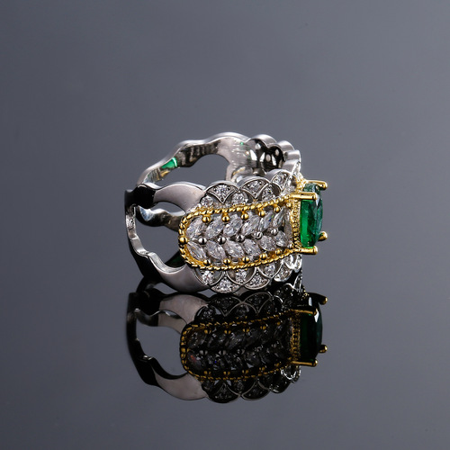 Foreign trade retro palace style hollow pattern women's two-color gold high-definition jewelry lace imitation emerald pigeon egg ring