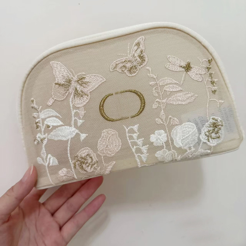 新しい貝殻型メッシュ刺繍花蝶半円レース化粧品袋中空ハンドヘルド化粧品収納袋|undefined
