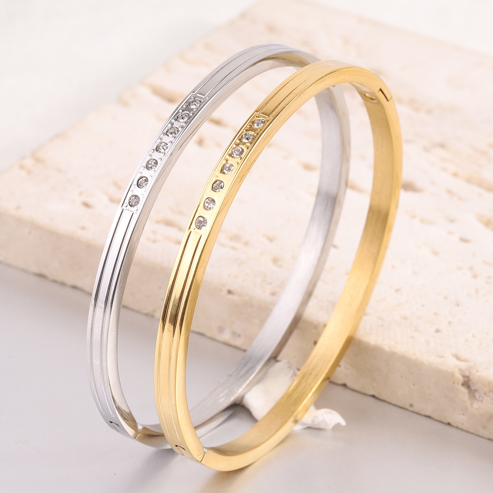 Wholesale Simple Style Solid Color Stainless Steel Inlay Zircon Bangle display picture 1