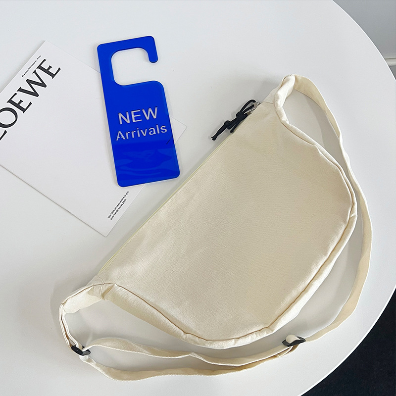 Fabricante nuevo lienzo bolsa de mensajero de los hombres y las mujeres del mismo estilo ins nicho versátil gran capacidad moda Commuter dumpling bolsa