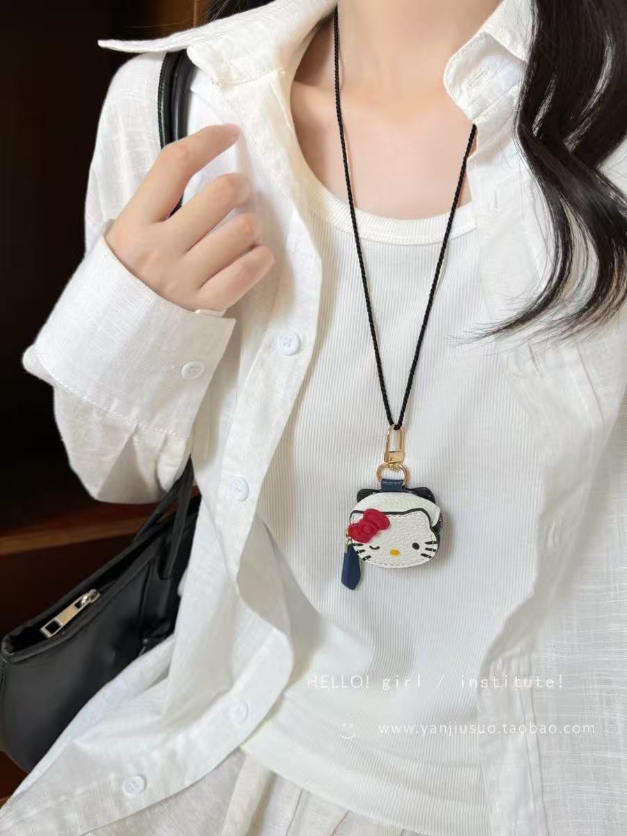 White kt cat necklace