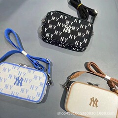 韓国の新型MLBバッグ男女カップルは、レトロなスポーツカジュアルな携帯通勤ファッションの小さなバッグを斜めに掛けている