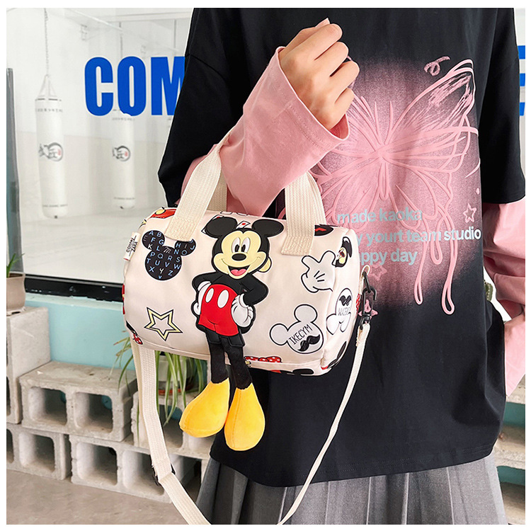In 2024, the best-selling children's bags will feature cute Mickey Mouse-patterned bowling bags for girls, casual hand-held shoulder bags, and a unique style undefined