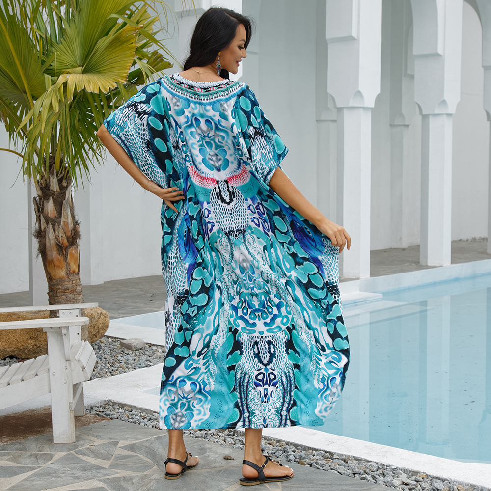 Blusa de playa de cuatro lados elástico impreso playa protección solar camisa traje falda de vacaciones bikini blusa europea y americana 5D35