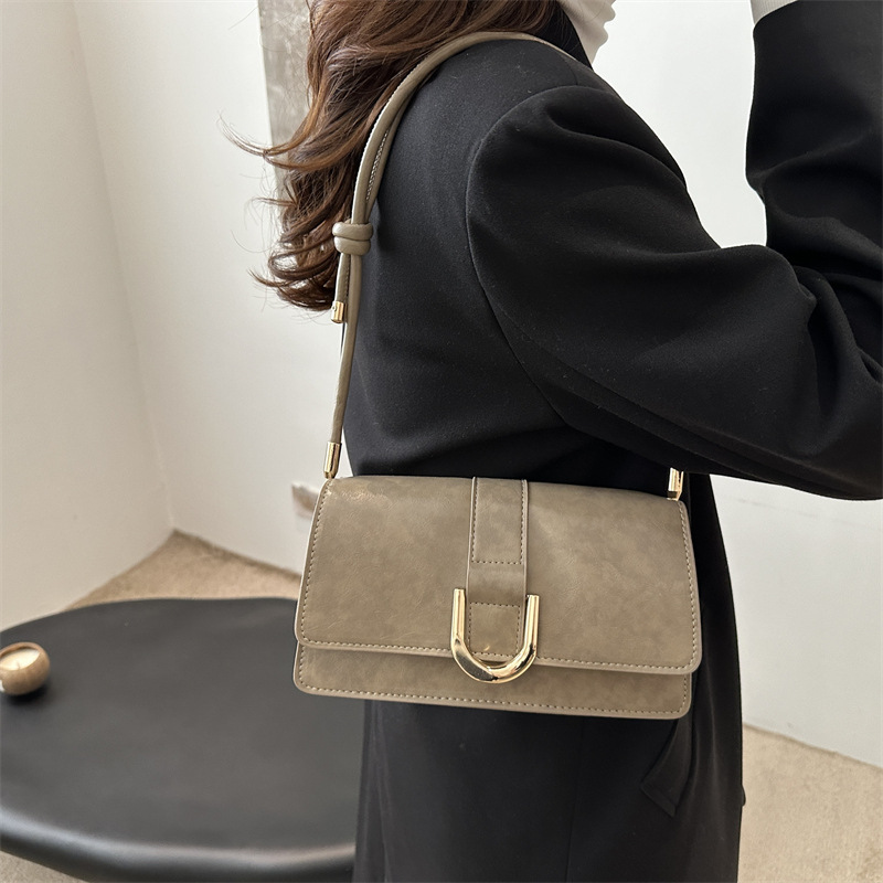 Diseño francés de nicho retro bolso debajo de la axila para mujeres 2024 otoño y invierno nuevo paquete de mano de hombro de alta calidad