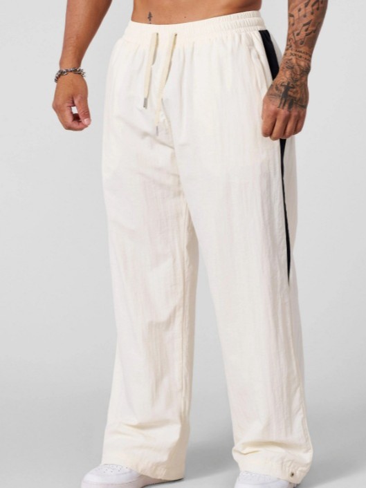 Pantalones deportivos y de ocio para hombres en primavera y otoño pantalones largos de algodón, arena de cáñamo, lavado de aire, flexibilización, tubo recto, pantalones de trapeador de colores transfronterizos europeos y estadounidenses