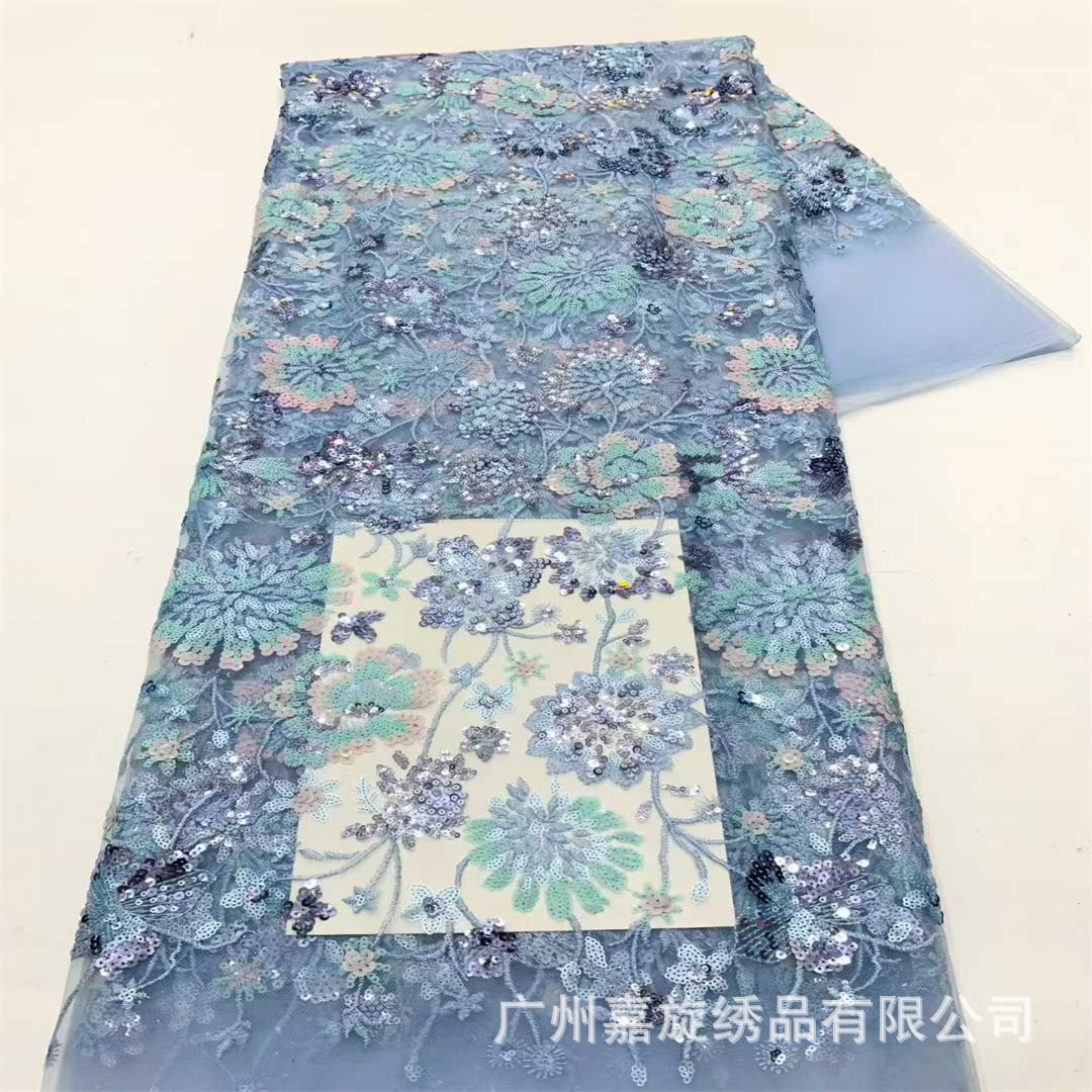 Primavera y verano color diente de león flor sequilla tela bordada estilo nacional cheongsam moda vestido de boda ropa infantil tela bordada