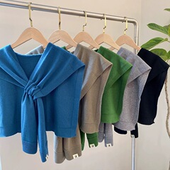 純色のニットの小さいショールの女性の薄いタイプの外は春と秋の冬の保温の韓国版の首の穴を開けて肩のエアコンの部屋のマフラーを穿孔します。