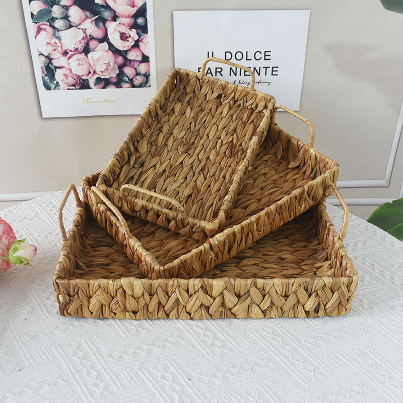 Jacinto de agua cesta de pan de hierba Cocina mesa de comedor en casa con mango que sostiene la cesta aperitivos de frutas cesta de aperitivos