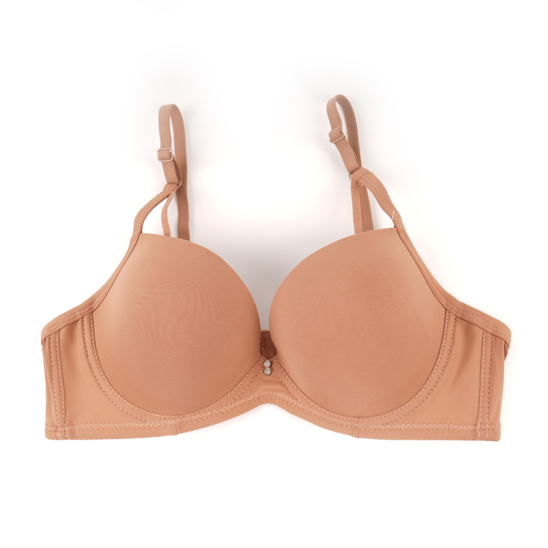 Fábrica de stock de ropa interior lisa sin marcas de pecho pequeño damas juntas sujetador de ajuste de soporte de la niñez sujetador del sudeste asiático