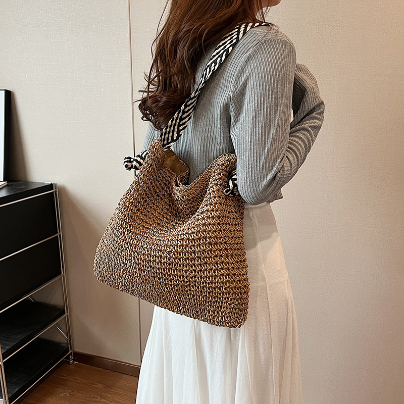 Bolsa de tejido a mano para mujeres 2024 nueva bolsa de hombro de vacaciones de playa de marea de gran capacidad para viajar bolsa de paja