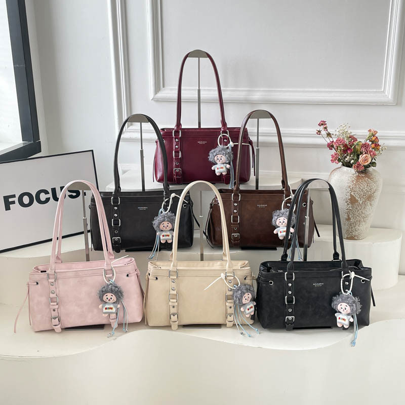 Bolsas de brazo coreanas lujosas retro 2026 verano nuevo estilo británico temperamento versátil bolsas de hombro de moda