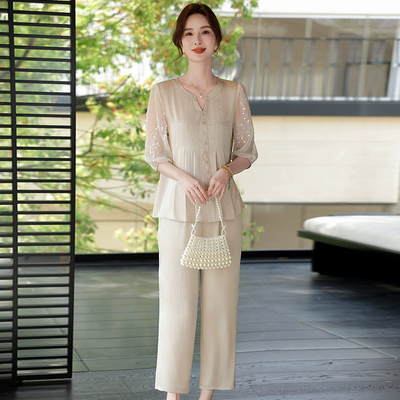 Темперамент тонкий, набор из двух частей, летняя женская одежда 2025 новый, уменьшающий возраст, прохладный досуг, тонкий, легкий средний рукав, широкий набор брюк