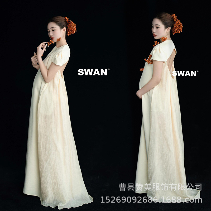 影楼の新型の早春の小清新な妊婦は服を撮影します。