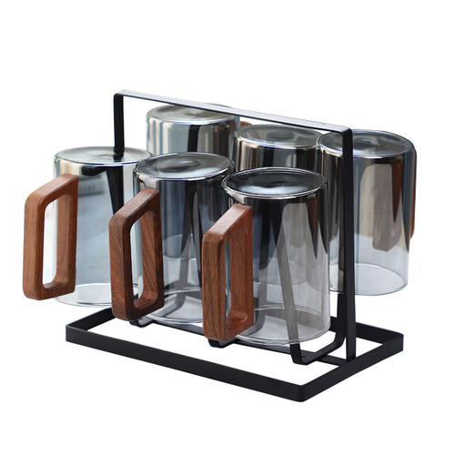 Cross-border wooden-handle glass tea cups, heat-resistant living room cups, and home-use hospitality water set—including a kettle and matching water glasses.