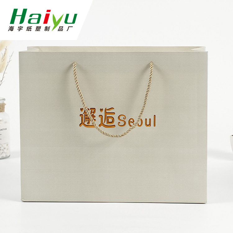 厂家制做购物礼品袋 白卡服装手提纸袋时尚服装袋 可制加印烫金