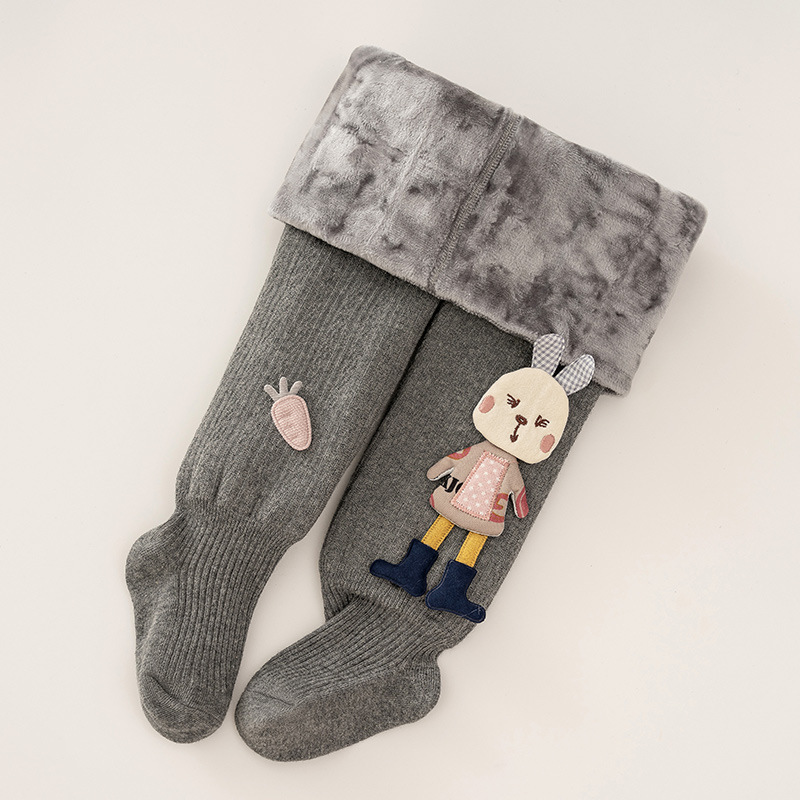 女の子のレギンスと秋冬のベルベットの厚い子供のレギンスの外に洋風の女の子のレギンスの赤ちゃんのレギンスのバッチを着ています。