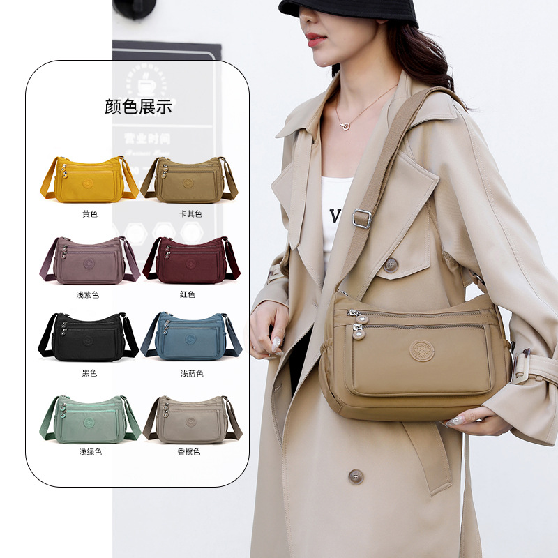 Bolsos bolsos para madres de mediana edad y ancianas 2024 nuevo bolso de mensajero de un solo hombro de tela de nailon bolso de bola de masa casual de viaje bolso de mujer