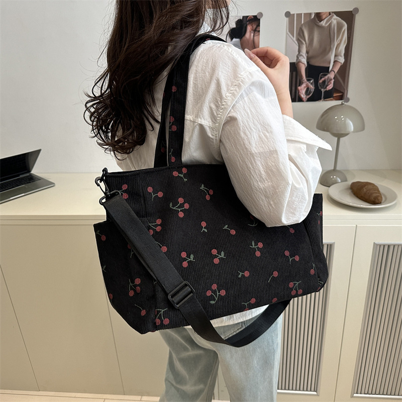 Este año, la popularidad de la bolsa de alto valor de la cara de 2025, primavera y verano, nueva moda, bolsa de hombro de gran capacidad, bolsa de ocio image 3