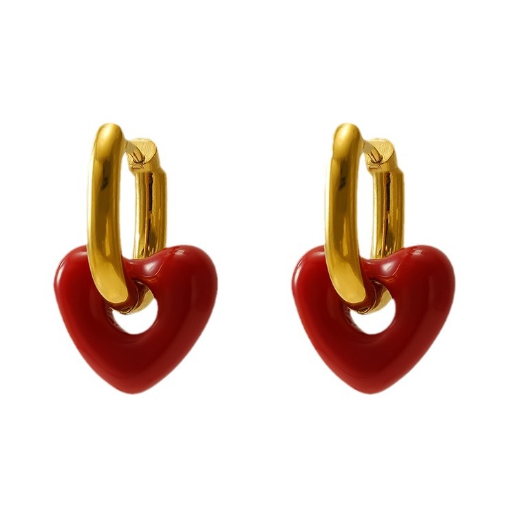 Nicho de diseño transfronterizo europeo y americano amor rojo aretes de acero de titanio de alta sensación de auriculares 2024 nuevos auriculares para mujeres