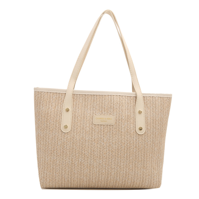 Bolso de paja de gran capacidad para viajeros para mujer 2024 nuevo estilo de moda y estilo occidental, bolso de axilas de color de contraste, bolso de Tote popular de este año