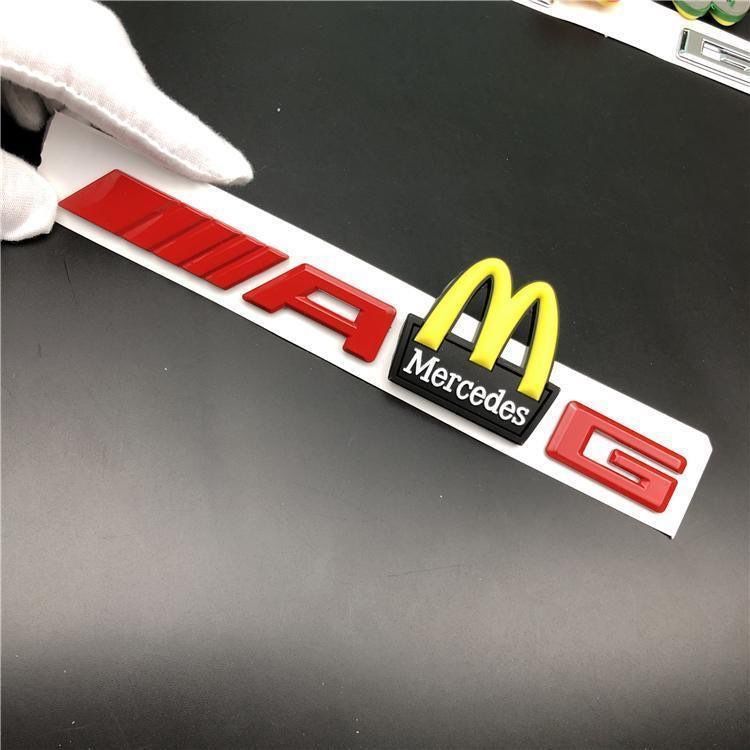 Mercedes-Benz C-Class, E-Class, and S-Class modified with AMG emblems, McDonald's car logos, BMW M logos, and new AMG tail emblems with black lettering