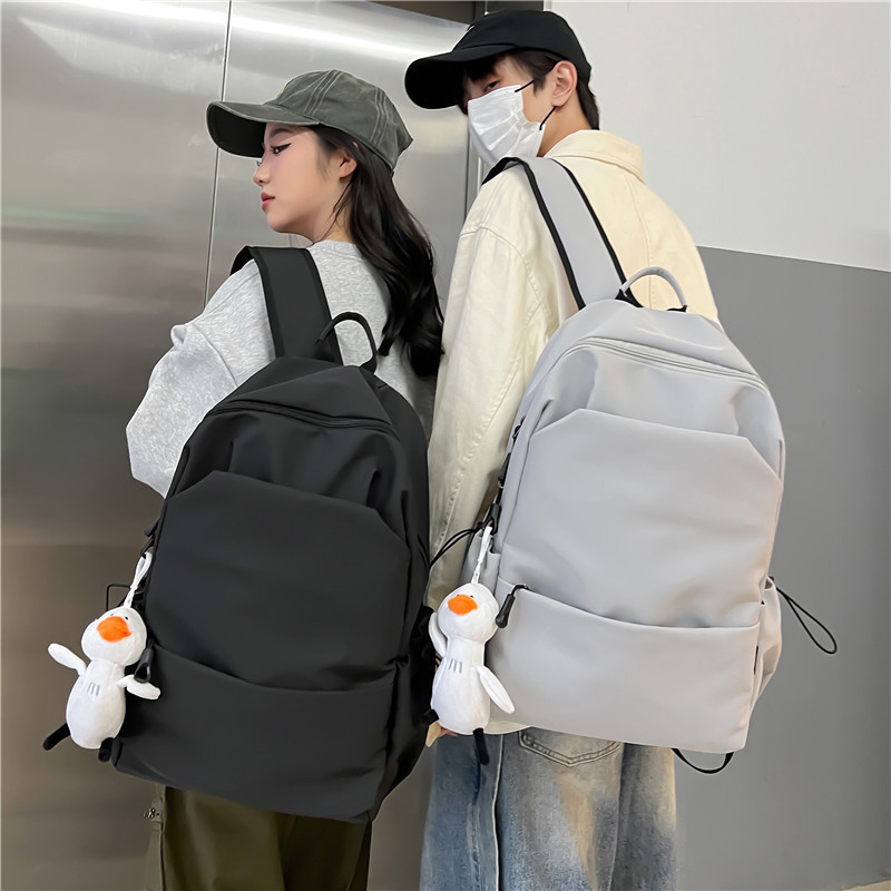 Large-Capacity Solid Color Backpack for Women, Korean Style, Simple and Versatile School Bag for Men, Junior High School Backpack for Women, College Student Waterproof Backpack