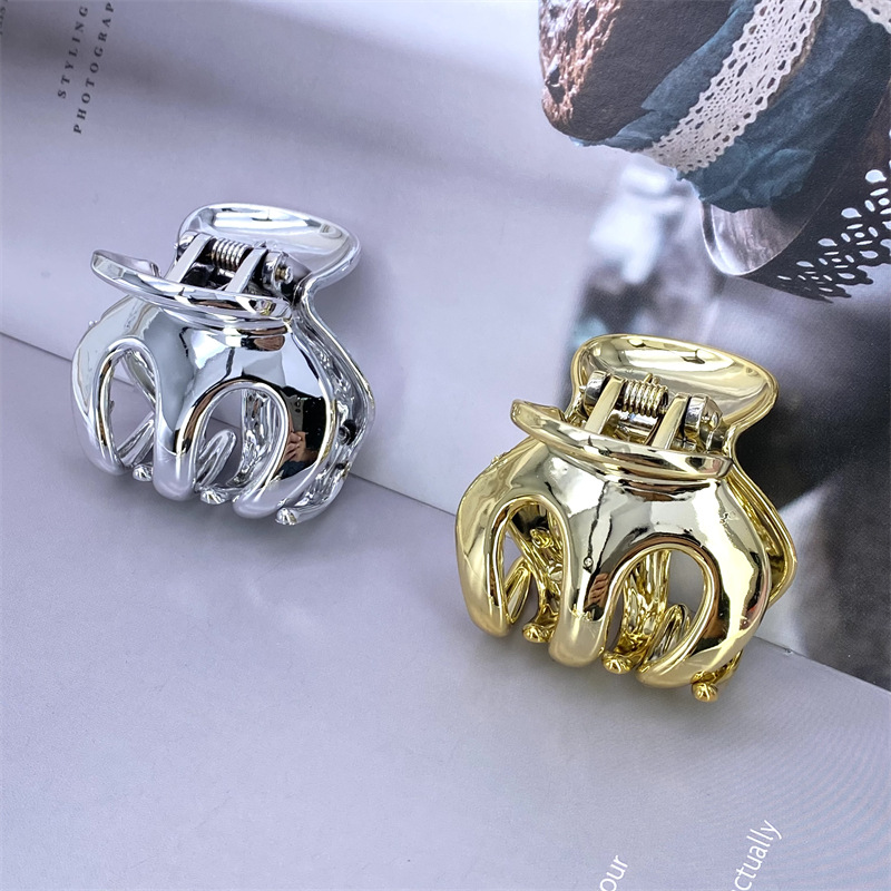 Galvanoplastia PC material continuo galvanoplastia uv4 color aumento de la altura horquilla tamaño pequeño agarre Clip 2 yuanes tienda física accesorios para el cabello accesorios de cabeza