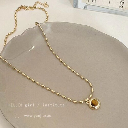 High-end millet tiger eye stone necklace women's autumn and winter retro sweater chain high-end atmospheric long pendant clavicle chain